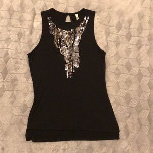 Black tank top with sequins on the front.